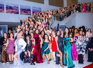 Women-Led Blunt Brunch is Redefining Cannabis Networking Hundreds of women in formal attire gathered on a staircase at a Blunt Brunch event, showcasing the scale, diversity, and vibrant community of women in cannabis.