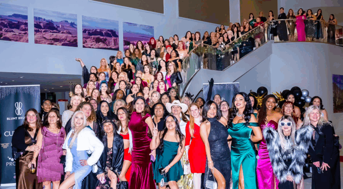 Women-Led Blunt Brunch is Redefining Cannabis Networking Hundreds of women in formal attire gathered on a staircase at a Blunt Brunch event, showcasing the scale, diversity, and vibrant community of women in cannabis.