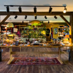 Sweetgrass Botanicals Sweeps 2025 Harvest Cup Cannabis Awards Sweetgrass Botanicals dispensary is housed in a charmingly reclaimed 1870s lakeside lodge.