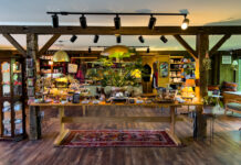 Sweetgrass Botanicals Sweeps 2025 Harvest Cup Cannabis Awards Sweetgrass Botanicals dispensary is housed in a charmingly reclaimed 1870s lakeside lodge.