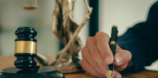 Cannabis Rescheduling FAQ: Your Questions Answered Legal documents and a gavel representing questions about the federal rulemaking process for cannabis rescheduling.