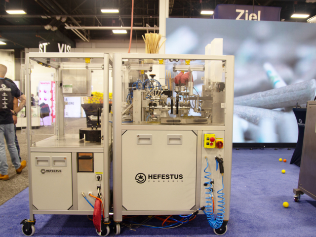 Hefestus machine for automated cannabis pre-roll production on display at MJBizCon 2025.