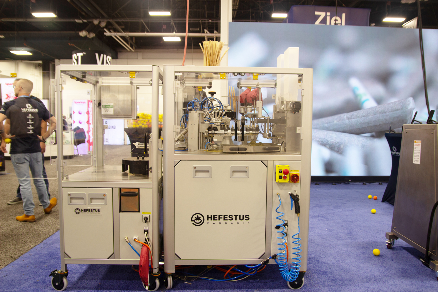 Hefestus machine for automated cannabis pre-roll production on display at MJBizCon 2025.