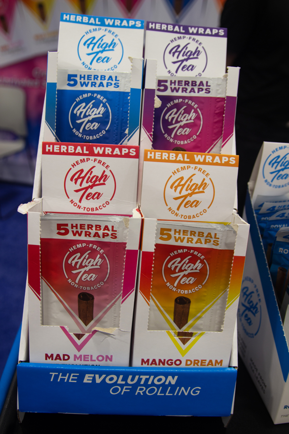 High Tea booth featuring hemp-free herbal wraps in multiple flavors at MJBizCon 2025.