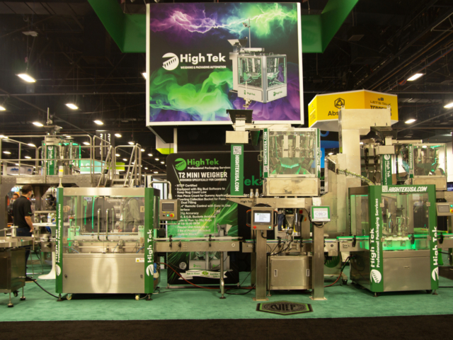 High Tek booth showcasing automated cannabis packaging and weighing systems at MJBizCon 2025.