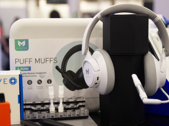 Myster's Puff Muffs wireless headphones and vape accessories on display at MJBizCon 2025.