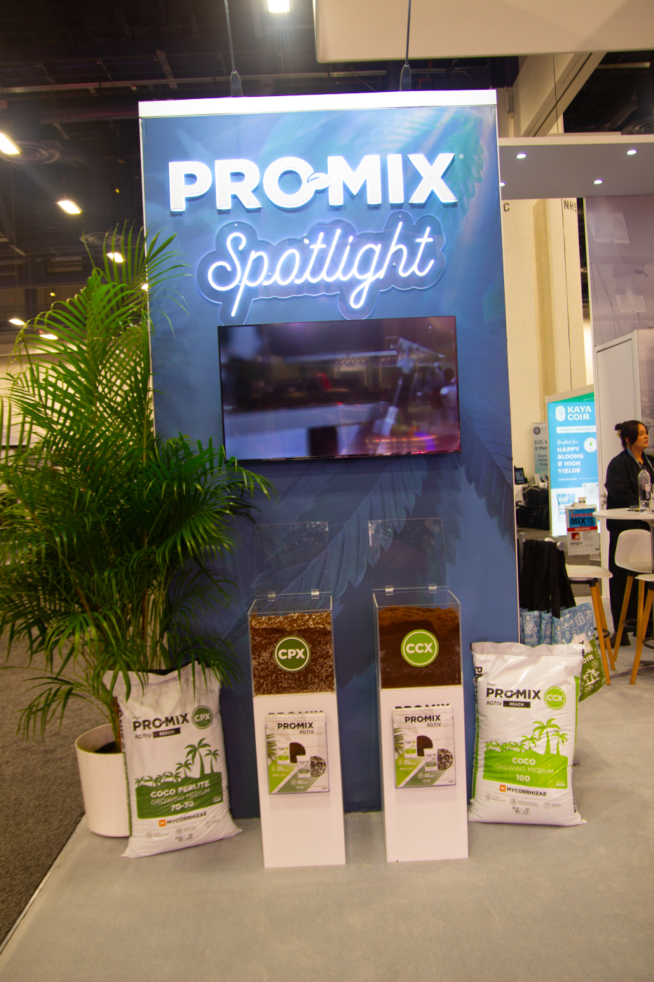Pro-Mix booth at MJBizCon 2025 featuring CPX and CCX growing media for cannabis cultivation.