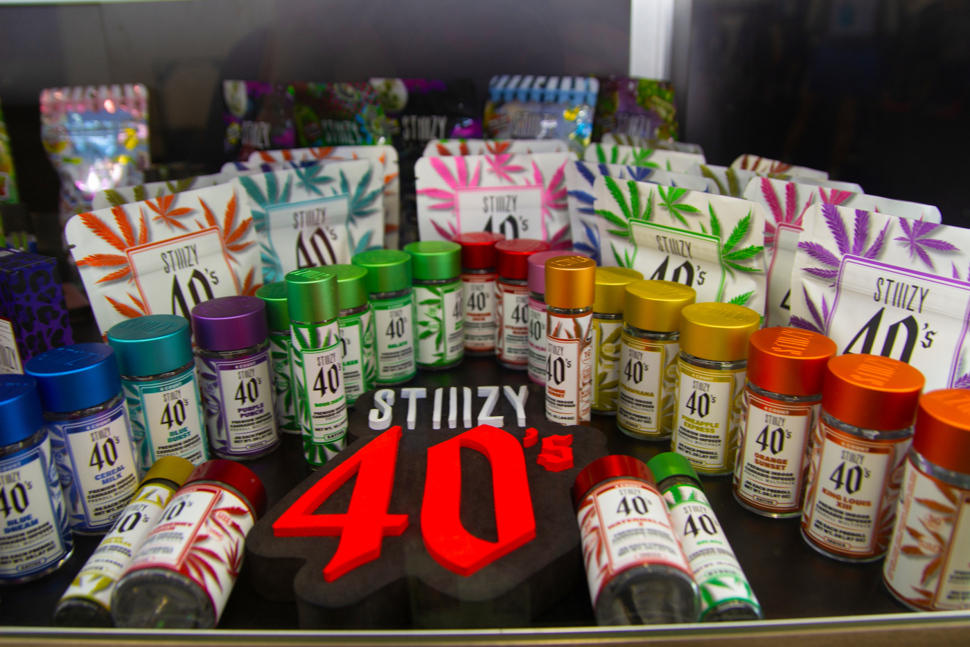 STIIIZY 40’s infused pre-roll jars and colorful packaging displayed at MJBizCon 2025.