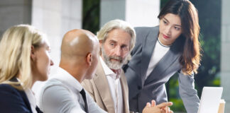 KCSA on Credibility, Consistency, and Playing the Long Game Senior communications advisors discuss strategy in a corporate setting, reflecting reputation-focused public relations counsel.