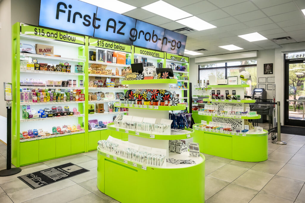 GreenPharms interior showing category shelving and central displays arranged for grab-and-go shopping.