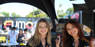 Inside Hall of Flowers Ventura 2026 Fumo brand representatives showcasing vape products at Hall of Flowers Ventura 2026 cannabis trade show in Ventura, California