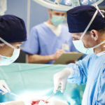 ASA Launches Navarro Family Organ Transplant Resource Center Surgeons in a clinical setting preparing for a procedure; used to illustrate medical cannabis transplant eligibility.