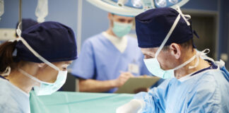 ASA Launches Navarro Family Organ Transplant Resource Center Surgeons in a clinical setting preparing for a procedure; used to illustrate medical cannabis transplant eligibility.