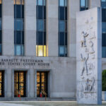 Rescheduling Under Fire: What the SAM Lawsuit Means for Operators Exterior of the United States Court of Appeals for the D.C. Circuit in Washington, D.C., photographed under overcast light. The neoclassical façade with tall stone columns conveys the gravity of federal judicial review.