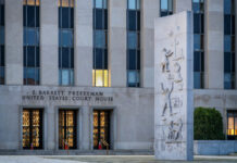 Rescheduling Under Fire: What the SAM Lawsuit Means for Operators Exterior of the United States Court of Appeals for the D.C. Circuit in Washington, D.C., photographed under overcast light. The neoclassical façade with tall stone columns conveys the gravity of federal judicial review.