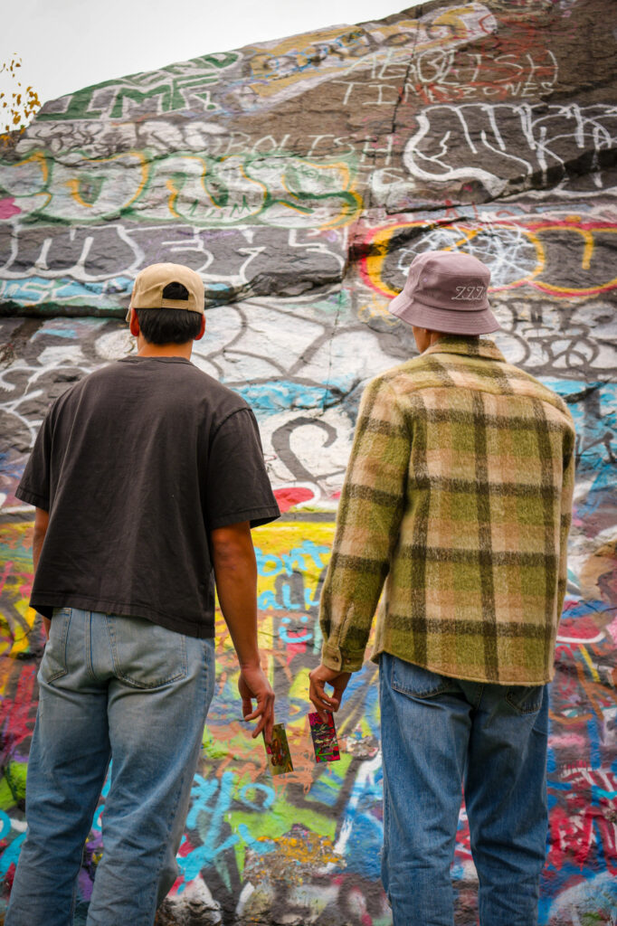 Cannabis enthusiasts admire original street art.