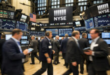 Trulieve Approved for NYSE Listing Following Medical-Only Restructuring Neutral-toned view of traders and electronic tickers on the New York Stock Exchange trading floor, illustrating Trulieve’s milestone listing.