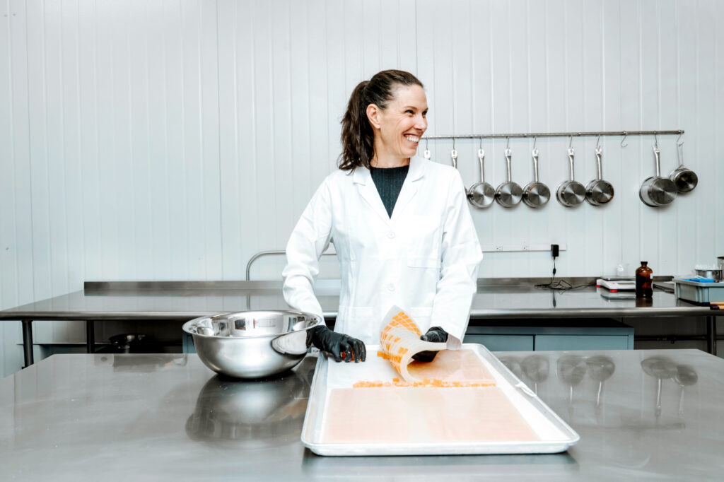 Sarah McLaughlin prepares gummy ingredients in Melt-to-Make’s formulation kitchen.