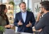 Rethinking Healthcare Benefits for Cannabis Employers Business professionals discussing healthcare benefits during an office meeting
