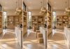 Three views of the same warm, wood-lined retail interior, progressing from sparse shelves to expanding inventory to organized displays.